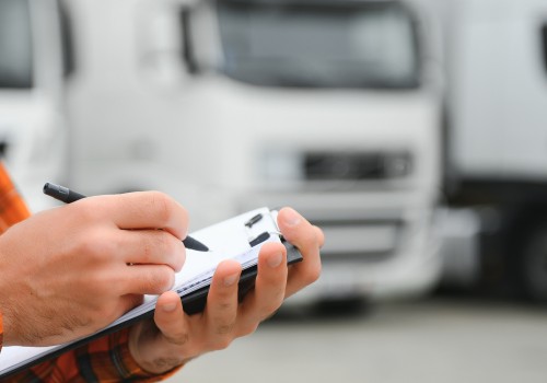Truck driver checking shipment